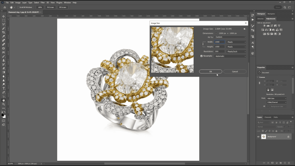 A diamond cluster ring with a large center stone and pave halo, photographed in the course, open in Photoshop during the Image Resizing lesson with the Image Size dialog visible.
