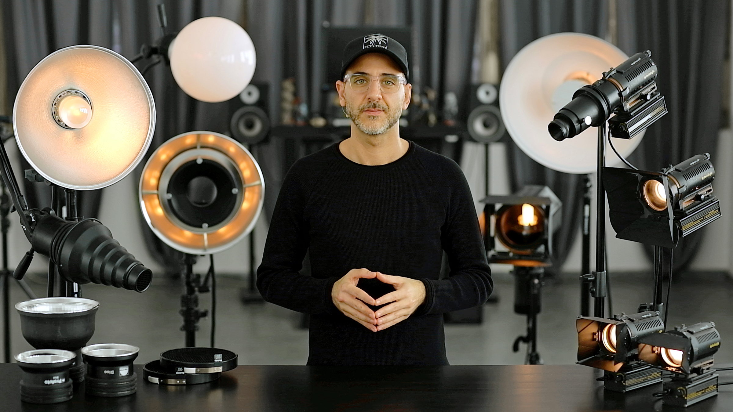 Ivan Moshe in his studio, surrounded by his lighting equipment